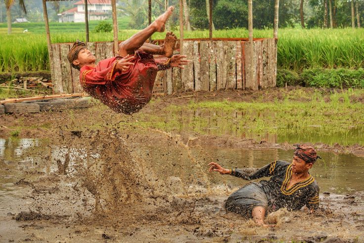 Silek lanyah, traditional martial arts of the Minangkabau people in West Sumatra, Indonesia. Silek lanyah is always performed in a muddy paddy field. Taken I 2020.